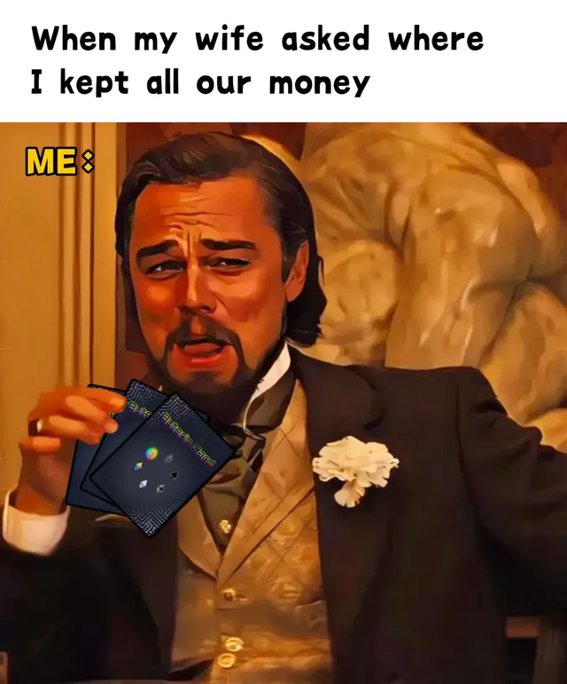 Leonardo DiCaprio's laughing Django Unchained reaction, captioned "When my wife asked where I kept all our money... Me:", holding two Buterin Cards